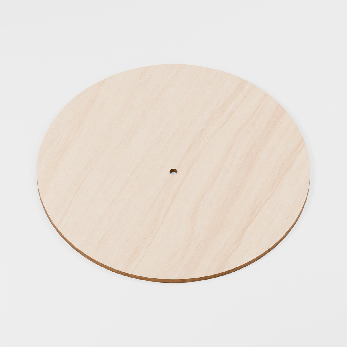 Bare wooden clock blank with centre shaft hole; no hands fitted — product visualisation
